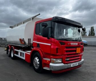 Side View: 2011 Scania P320 6x2 fuel tanker with 20,000-liter capacity, 4 compartments, and hose & reel for efficient fuel delivery.